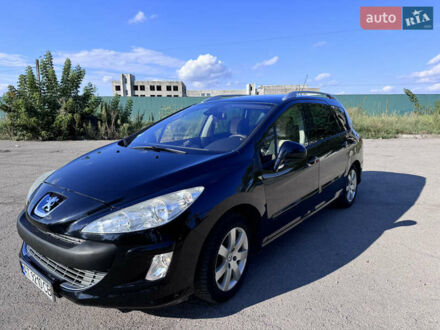 Черный Пежо 308, объемом двигателя 1.6 л и пробегом 203 тыс. км за 6100 $, фото 1 на Automoto.ua