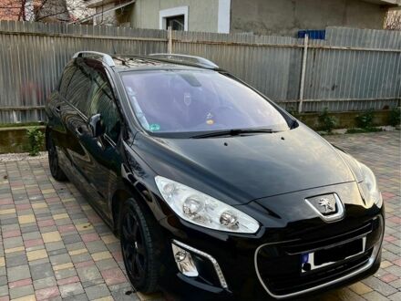 Чорний Пежо 308, об'ємом двигуна 1.6 л та пробігом 168 тис. км за 5800 $, фото 1 на Automoto.ua