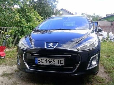Черный Пежо 308, объемом двигателя 1.56 л и пробегом 274 тыс. км за 6500 $, фото 1 на Automoto.ua