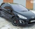 Чорний Пежо 308, об'ємом двигуна 1.6 л та пробігом 127 тис. км за 9200 $, фото 1 на Automoto.ua