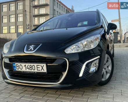 Чорний Пежо 308, об'ємом двигуна 1.6 л та пробігом 270 тис. км за 6199 $, фото 1 на Automoto.ua