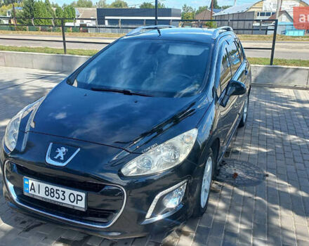 Черный Пежо 308, объемом двигателя 1.56 л и пробегом 200 тыс. км за 5700 $, фото 1 на Automoto.ua