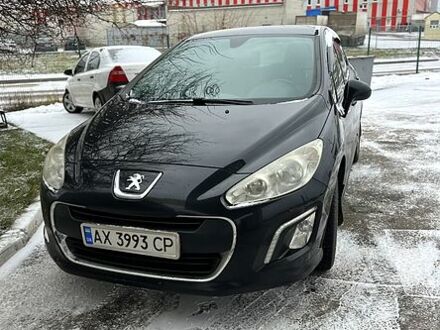 Чорний Пежо 308, об'ємом двигуна 1.6 л та пробігом 169 тис. км за 3699 $, фото 1 на Automoto.ua