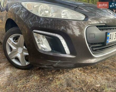 Коричневый Пежо 308, объемом двигателя 1.6 л и пробегом 142 тыс. км за 6000 $, фото 10 на Automoto.ua