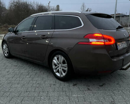 Коричневый Пежо 308, объемом двигателя 1.56 л и пробегом 309 тыс. км за 8000 $, фото 13 на Automoto.ua