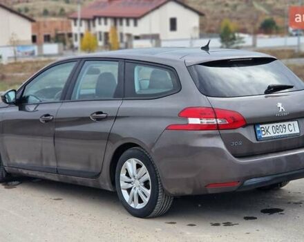 Пежо 308 2014 в Ровно на Automoto.ua Коричневый Пежо 308, объемом двигателя 1.56 л и пробегом 252 тыс. км за 9200 $, фото 8 на Automoto.ua