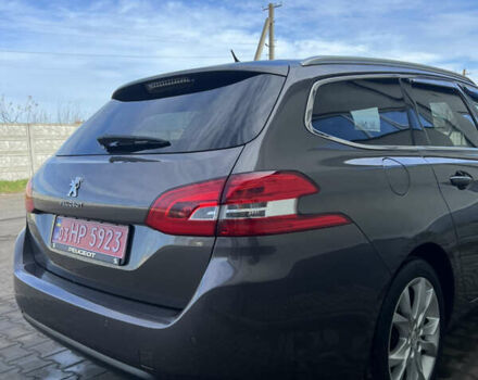 Коричневый Пежо 308, объемом двигателя 2 л и пробегом 240 тыс. км за 11300 $, фото 16 на Automoto.ua