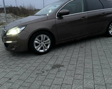 Коричневый Пежо 308, объемом двигателя 1.56 л и пробегом 309 тыс. км за 8000 $, фото 16 на Automoto.ua