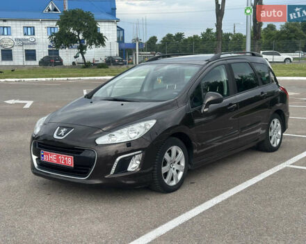 Коричневый Пежо 308, объемом двигателя 1.6 л и пробегом 259 тыс. км за 6850 $, фото 1 на Automoto.ua
