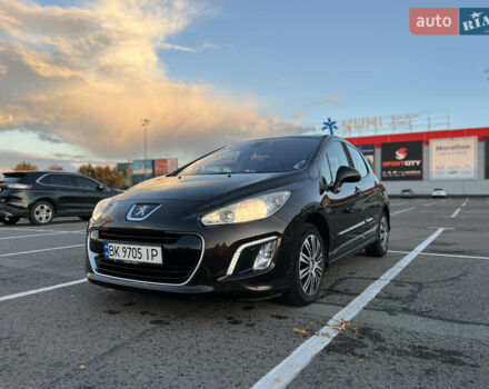 Коричневый Пежо 308, объемом двигателя 1.6 л и пробегом 218 тыс. км за 5850 $, фото 1 на Automoto.ua