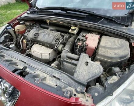 Червоний Пежо 308, об'ємом двигуна 1.6 л та пробігом 119 тис. км за 5800 $, фото 5 на Automoto.ua