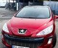 Красный Пежо 308, объемом двигателя 1.6 л и пробегом 156 тыс. км за 6000 $, фото 1 на Automoto.ua