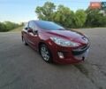 Красный Пежо 308, объемом двигателя 1.6 л и пробегом 99 тыс. км за 5900 $, фото 1 на Automoto.ua