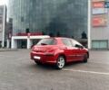 Красный Пежо 308, объемом двигателя 1.69 л и пробегом 185 тыс. км за 6200 $, фото 1 на Automoto.ua