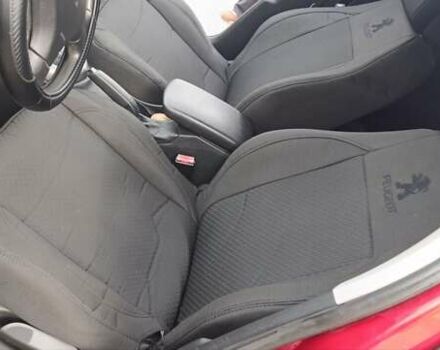 Красный Пежо 308, объемом двигателя 1.6 л и пробегом 156 тыс. км за 6000 $, фото 5 на Automoto.ua