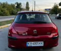 Красный Пежо 308, объемом двигателя 1.6 л и пробегом 159 тыс. км за 5500 $, фото 11 на Automoto.ua