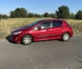 Красный Пежо 308, объемом двигателя 1.6 л и пробегом 160 тыс. км за 5739 $, фото 1 на Automoto.ua
