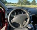 Красный Пежо 308, объемом двигателя 1.6 л и пробегом 160 тыс. км за 5739 $, фото 4 на Automoto.ua