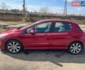 Красный Пежо 308, объемом двигателя 1.56 л и пробегом 250 тыс. км за 5500 $, фото 1 на Automoto.ua