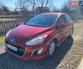 Красный Пежо 308, объемом двигателя 1.6 л и пробегом 268 тыс. км за 6300 $, фото 1 на Automoto.ua