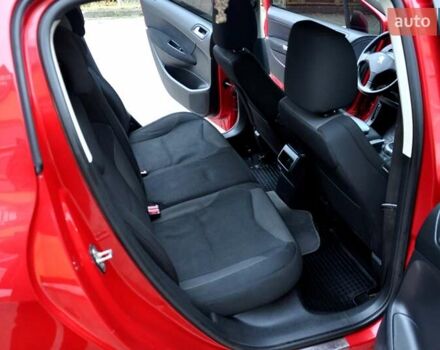 Червоний Пежо 308, об'ємом двигуна 1.6 л та пробігом 190 тис. км за 5999 $, фото 13 на Automoto.ua