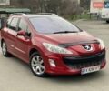 Красный Пежо 308, объемом двигателя 1.6 л и пробегом 170 тыс. км за 4888 $, фото 1 на Automoto.ua