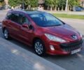 Красный Пежо 308, объемом двигателя 1.6 л и пробегом 268 тыс. км за 5600 $, фото 1 на Automoto.ua