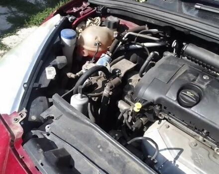 Красный Пежо 308, объемом двигателя 1.6 л и пробегом 170 тыс. км за 3000 $, фото 6 на Automoto.ua