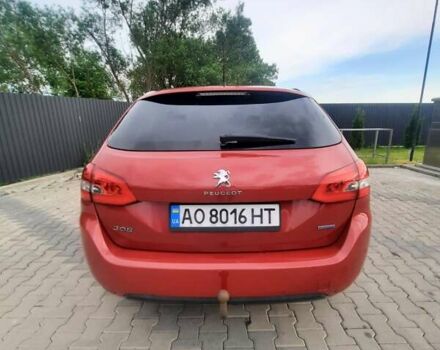 Красный Пежо 308, объемом двигателя 2 л и пробегом 182 тыс. км за 10500 $, фото 6 на Automoto.ua