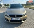 Желтый Пежо 308, объемом двигателя 1.56 л и пробегом 238 тыс. км за 10500 $, фото 1 на Automoto.ua