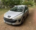 Серый Пежо 308, объемом двигателя 1.4 л и пробегом 269 тыс. км за 3800 $, фото 1 на Automoto.ua