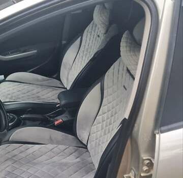 Серый Пежо 308, объемом двигателя 1.6 л и пробегом 450 тыс. км за 6000 $, фото 3 на Automoto.ua