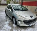 Серый Пежо 308, объемом двигателя 1.59 л и пробегом 233 тыс. км за 4999 $, фото 1 на Automoto.ua