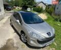 Серый Пежо 308, объемом двигателя 2 л и пробегом 309 тыс. км за 6400 $, фото 1 на Automoto.ua
