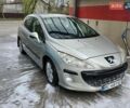 Серый Пежо 308, объемом двигателя 1.59 л и пробегом 233 тыс. км за 5400 $, фото 1 на Automoto.ua