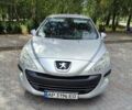 Серый Пежо 308, объемом двигателя 1.56 л и пробегом 146 тыс. км за 7500 $, фото 1 на Automoto.ua