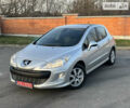 Серый Пежо 308, объемом двигателя 1.6 л и пробегом 247 тыс. км за 7799 $, фото 1 на Automoto.ua