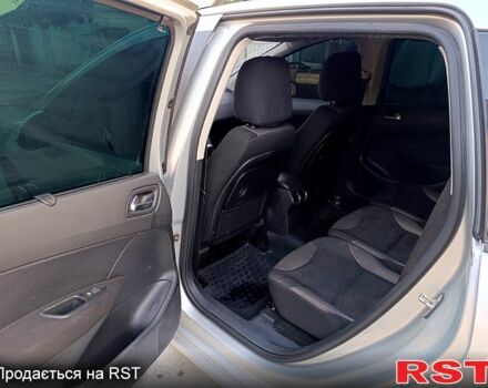 Серый Пежо 308, объемом двигателя 1.6 л и пробегом 350 тыс. км за 4000 $, фото 4 на Automoto.ua