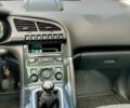 Сірий Пежо 308, об'ємом двигуна 1.6 л та пробігом 245 тис. км за 11700 $, фото 2 на Automoto.ua