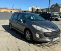 Серый Пежо 308, объемом двигателя 1.56 л и пробегом 280 тыс. км за 4800 $, фото 1 на Automoto.ua