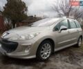 Сірий Пежо 308, об'ємом двигуна 1.56 л та пробігом 260 тис. км за 5200 $, фото 1 на Automoto.ua