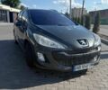 Серый Пежо 308, объемом двигателя 1.56 л и пробегом 350 тыс. км за 3850 $, фото 1 на Automoto.ua