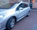 Сірий Пежо 308, об'ємом двигуна 1.56 л та пробігом 290 тис. км за 5850 $, фото 1 на Automoto.ua