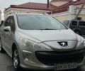 Серый Пежо 308, объемом двигателя 1.56 л и пробегом 280 тыс. км за 5800 $, фото 1 на Automoto.ua