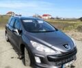 Сірий Пежо 308, об'ємом двигуна 0.16 л та пробігом 242 тис. км за 5800 $, фото 1 на Automoto.ua