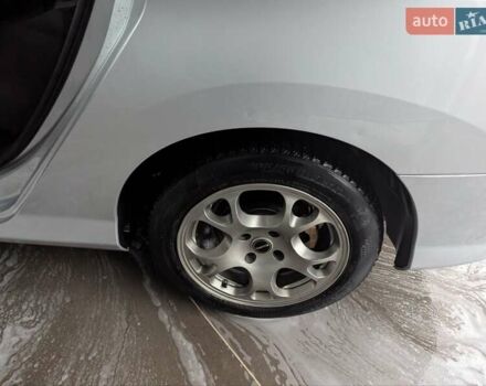 Серый Пежо 308, объемом двигателя 1.6 л и пробегом 202 тыс. км за 5250 $, фото 6 на Automoto.ua