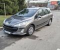 Сірий Пежо 308, об'ємом двигуна 1.6 л та пробігом 281 тис. км за 4350 $, фото 1 на Automoto.ua