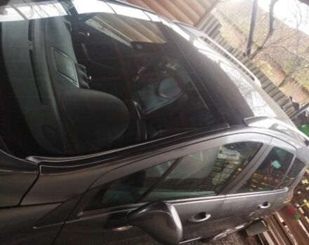 Серый Пежо 308, объемом двигателя 1.6 л и пробегом 250 тыс. км за 5500 $, фото 9 на Automoto.ua