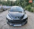 Серый Пежо 308, объемом двигателя 1.56 л и пробегом 253 тыс. км за 5700 $, фото 1 на Automoto.ua