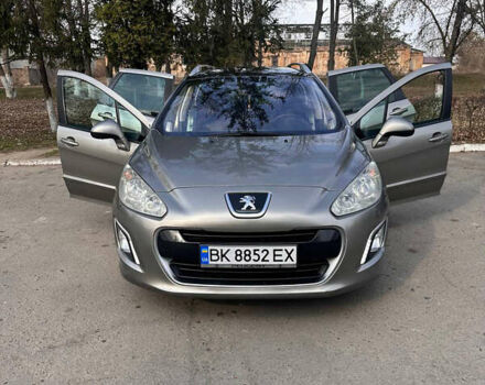 Сірий Пежо 308, об'ємом двигуна 1.56 л та пробігом 282 тис. км за 6099 $, фото 5 на Automoto.ua
